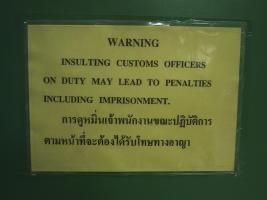 WARNING: Insulting customs officers on duty may leads to penalties including imprisonment.