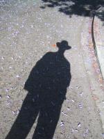The shadow of the man in the
felt hat.